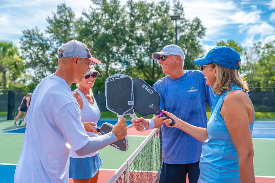 Residents playing pickleball at Esplanade at Azario, Lakewood Ranch